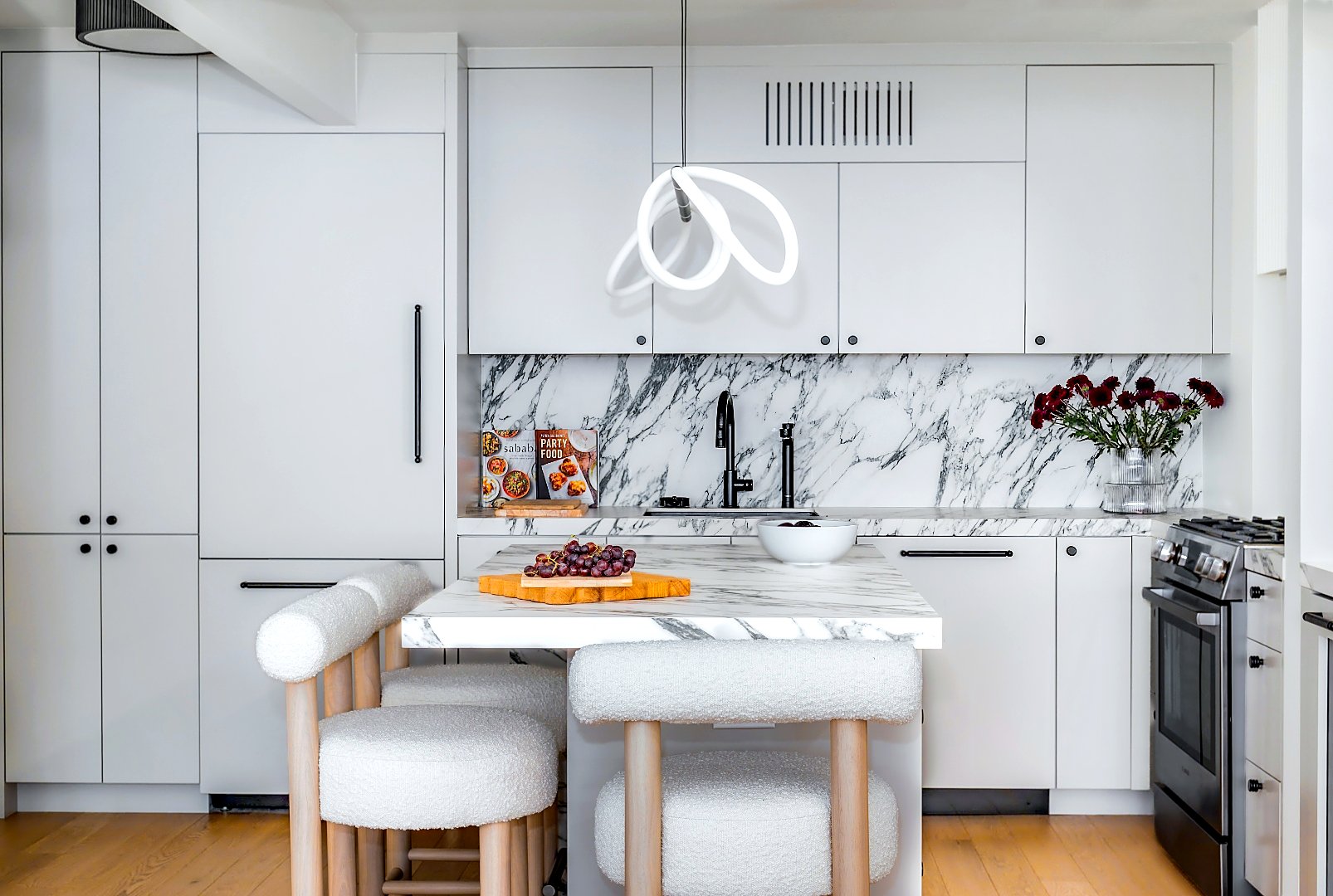 East 69th Street kitchen — arabescato marble