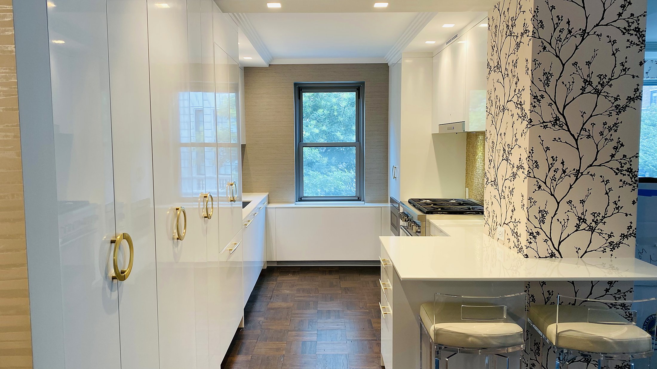 650 Park Avenue powder bath — botanical wallpaper, black-lacquer vanity, marble checkerboard floor